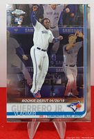 Front view of 2019 Topps Chrome Rookie Debut Vladimir Guerrero Jr. baseball card showing player in action and design details.