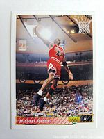Front of 1991 Upper Deck Michael Jordan basketball card showing airborne dunk image.
