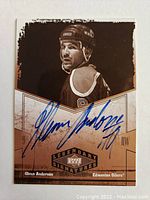 Front of the hockey card showing Glenn Anderson in Edmonton Oilers uniform with autograph.