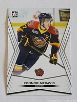 Front of 2015 Connor McDavid OHL rookie hockey card showing player in Erie Otters jersey.