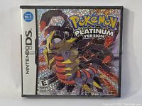 Front of sealed Nintendo DS Pokémon Platinum game case with holographic cover art