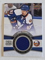 Front of John Tavares Upper Deck NHL trading card featuring game-used jersey patch.