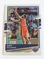 Front view of the Zion Williamson basketball card showing player action image and team logo.