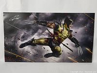 Full view of the signed 11x16 Wolverine poster showing the entire artwork and signature