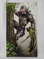 Full view of the signed Predator Aliens poster showing the full image including sport and background in good condition.