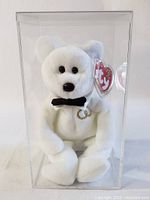 White Ty Beanie Baby "Valentino" bear in clear protective case, front view