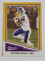 Front of Stefon Diggs Classic football card with gold parallel and Minnesota Vikings imagery