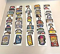 Array of 55 assorted Wacky Packages sticker cards arranged in rows, showing various parody branded product designs.
