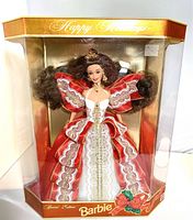 Full view of the Happy Holidays Barbie doll in original box, showing the festive dress and packaging details.