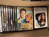 Photo showing DVD spines including Rocky Balboa, Rain Man, Eddie and the Cruisers, My Blue Heaven, and Tommy Boy.