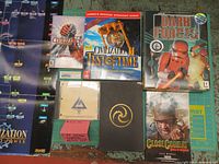 Top down view of all items showing covers, manuals, and CD disk arrangement