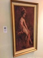 Angled full view of framed print on wall
