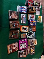 Assorted packs and loose single cards laid out on table