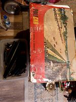 Large worn Policar box with Italian race track design, showing age and damage