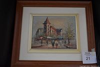 Framed painting showing overall view of the artwork with wooden and matte framing.