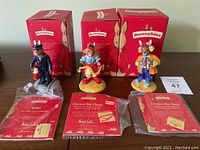 Three Bunnykins ceramic figurines: Sailor, Clarissa the Clown, Clarence the Clown, each with original Bunnykins red box and certificates in plastic sleeves.