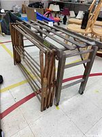 Photo of antique wooden wash stand and collapsible drying rack showing construction and folding mechanism