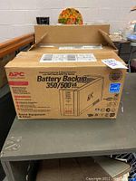 Front view of box showing 'Battery Backup 350/500 VA' text and APC logo
