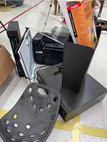 Photo of Canon printer scanner with open lid, Mash 5 player, Roxio Easy CD Creator software box, and other electronics.