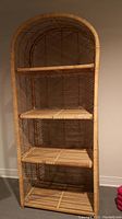 Front view of full sea grass and wicker shelving unit
