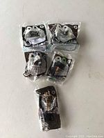 Five Star Wars The Clone Wars collectible toys from 2011 in original sealed McDonalds Happy Meal packaging, numbers 1,3,4,5,6 visible.