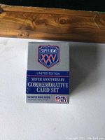 Front view of the sealed Super Bowl XXV limited edition silver anniversary commemorative card set box.