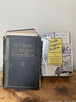 Photo showing both books side by side on table: Dr. Chase's Combination Receipt Book and Devils Drugs and Doctors with visible dust jacket and faded cover.