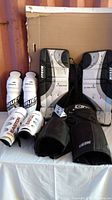 Overview of all items: goalie pads, shin guards, hockey pants