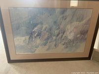 Full view of framed watercolor artwork depicting natural abstract forms in blue and gray
