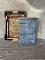 Apothecary cabinet and two serving trays together, showing size and front view of cabinet drawers and tray details.