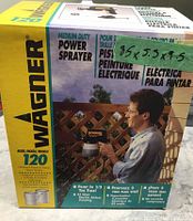 Original box of Wagner medium duty power sprayer model 120 showing package graphics and dimensions 8.5x5.5x9.5 inches.