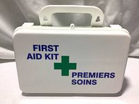 Front view of closed white plastic first aid kit case labeled 'FIRST AID KIT PREMIERS SOINS'
