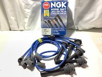 NGK ignition wire set with blue cables and black connectors displayed with original box in background