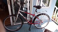 Full left side view of Fuji Regis men's bike showing overall condition and colors.