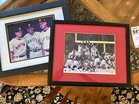 Two framed sports photos: MLB players and NFL team football action