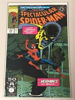 Front cover of Marvel Spectacular Spider-Man Comic Book Issue 178 featuring Spider-Man and a villain with yellow face, inside protective plastic sleeve.