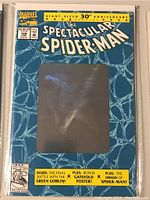 Front cover of the Marvel Spectacular Spider-Man 30th Anniversary comic book, issue #189, showing blue web design background with holographic square image and text details about content.