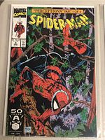Photo of front cover of Marvel Spider-Man comic book 'Perceptions' Part 1 of 5 in plastic sleeve, showing detailed cover art with Spider-Man in tree branches.