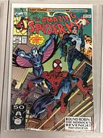 Photo of the comic book cover showing The Amazing Spider-Man issue 353 with Spider-Man, The Punisher, and The Falcon on the front.