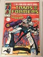 Front cover of Marvel Transformers comic book issue #3 featuring Spiderman guest appearance.