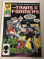 Front cover of Marvel Transformers Comic Book issue 7 showing characters in action and comic title.
