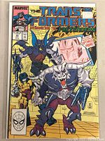 Front cover of Marvel Transformers comic book issue 40 depicting the Pretenders and Optimus Prime with price label and wear visible.