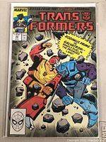 Front cover of Marvel Transformers comic book issue #43 showing Rodimus Prime vs. Galvatron fight scene artwork.