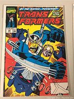 Front cover of Marvel Transformers comic book number 66 showing the title and main character illustration with swords.