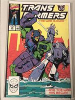 Front cover of Marvel Transformers comic book issue number 72, showing cover art with Transformers robots fighting, Marvel Comics logo, issue details and publication date.