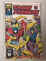 Front cover of Marvel Transformers comic book issue 74 showing colorful artwork of Optimus Prime, Scorponok, and smaller characters.