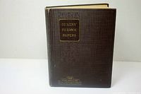 Front cover of the brown textured hardcover book with gold embossed text reading 'DICKENS' PICKWICK PAPERS' and 'THE MACMILLAN POCKET CLASSICS'