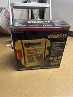 Front side of the Vector Start-It jump-start system box showing model and product features.
