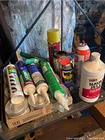 Overview of household maintenance products including caulk, WD-40, Naval Jelly rust remover, spray foam and water putty