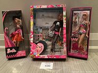 All three dolls in original boxes on floor